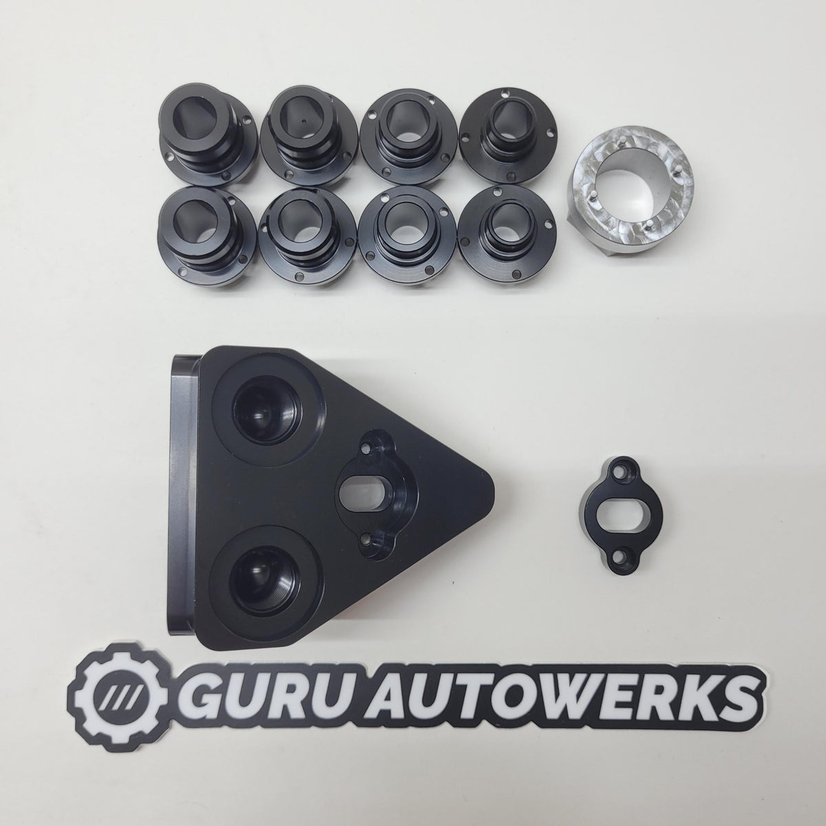 Cooler adapter underside, port fittings in all sizes, spacer and install tool