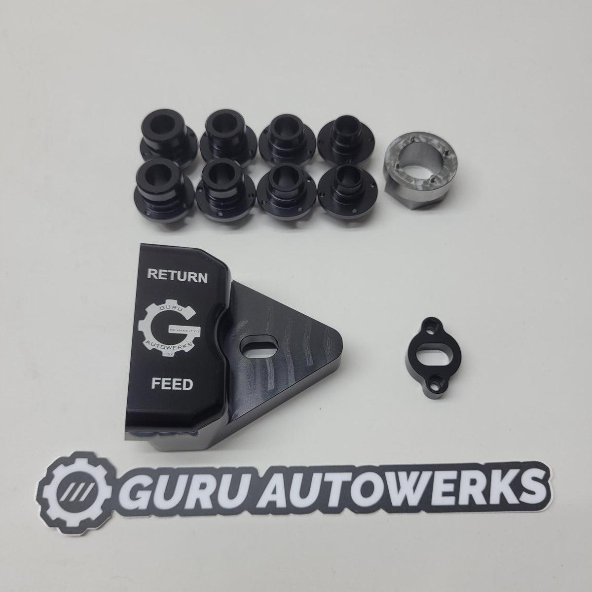 Cooler adapter top view with port fittings, spacer and install tool